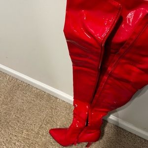 Thigh high red boots